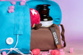 Blue bag spilling out with a character's hat on a pencil case with a wanted zipper tag.